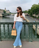 Bershka Light Blue High-Waisted Flare Jeans.