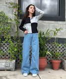 MNG High-Waisted Light Blue Wide-Leg Jeans.